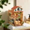 Book Nook Sunset Isle, Bausatz mit Küstenstadt und zwei Lichtstimmungen